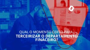 Empresário pensativo, apoiando a cabeça sobre uma das mãos, diante de uma tela de computador com dados e gráficos.