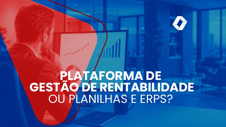 Executivo analisando gráficos financeiros em uma tela de computador em escritório